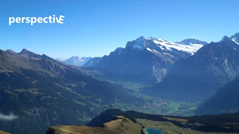 Snowy mountains under blue sky