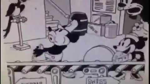 MICKEY MOUSE MAKING SWISS CHEESE, HE IS MAKING HOLES IN THE CHEESE WITH HIS ERECT PENIS