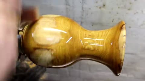 Polish The Surface Of A Wooden Vase