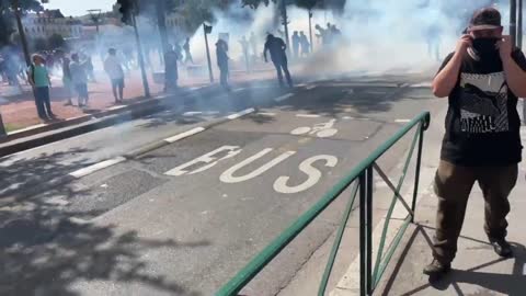 Tear gas deployed as early clashes in Lyon.