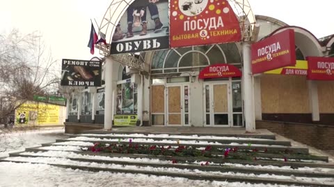 Donetsk in mourning after Sunday market strike