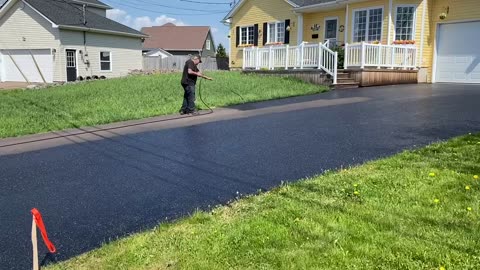 Professional Asphalt Spray Sealing: “WOW … It’s Not Raining” Top Coats Pavement Maintenance