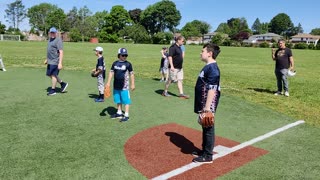 Spencer playing baseball VID_20220529_101415