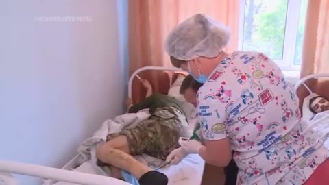 Russian tv shows POW Ukrainians treated in Russian hospitals