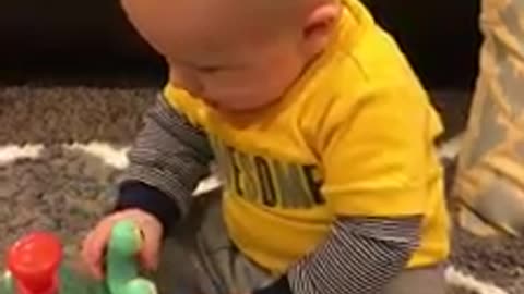 Adorable Baby Boy Is Disappointed Because Toy Is Not Edible