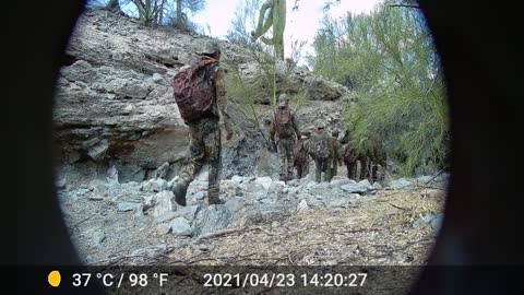 EXCLUSIVE: 19 Men in Matching Military-Style Gear Spotted Just North of Mexico Border in Arizona