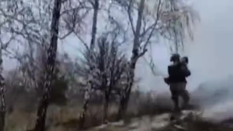 Ukrainian soldiers at the Kiev reservoir firing from Igla MANPADS at Russian helicopters