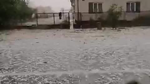 Car Hammered by Hail