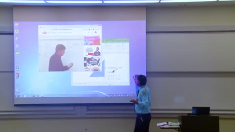 Math Professor fixes projector secreen (April fools prank)