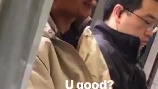 Man flicks his tongue up and down on subway train