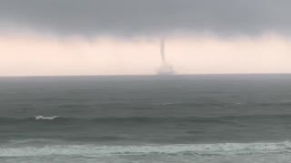 Friends Watching a Waterspout