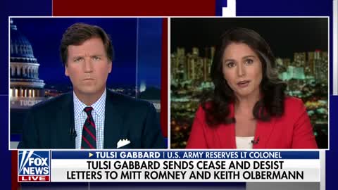 Gabbard pulls out wild card in feud with Romney