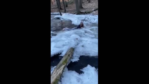 Epic fail_ Woman slips and falls into frozen water