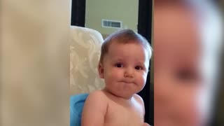 Baby Makes Weird Faces For Dad