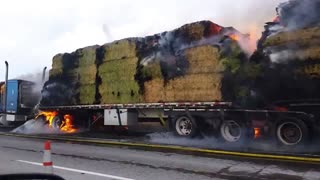 Burning hay truck along I-84