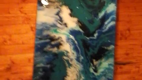 Acrylic pour paint, covered in Epoxy.