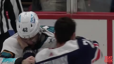 Caps and Sharks players fight after the game ends, a breakdown