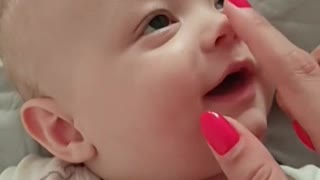 A very cute baby get sleep when you push the button