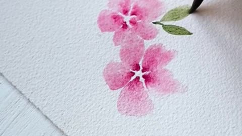 If you’re stuck with watercolor flowers, try this easy way to paint perfect little petals every time