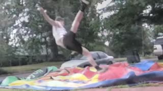 Music black shorts tries to jump over slide on glass