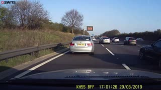 Driver stops on motorway while young boy has a wee