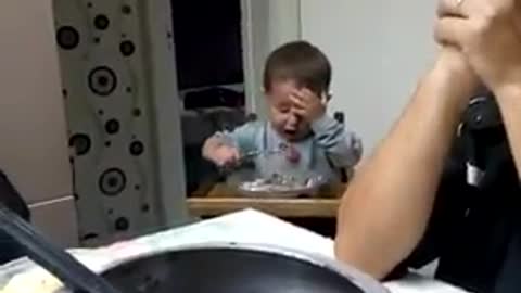 Kid Sneaks In Bite Of Food During Family Prayer