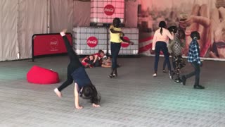 Little Girl Fails at Handstand at the Silent Disco