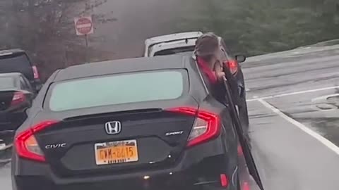 Girl Hangs Out of Car to Transport Empty Box