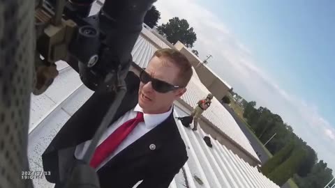 Body cam footage of the Secret Service and the police on top of the roof with the dead shooter