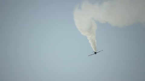 Playing performing a stunt in the sky