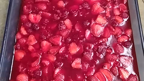 Cherry jello with fresh strawberries and raspberries