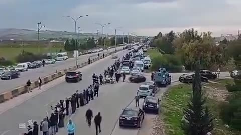 Protesters in Jordan formed a human chain to block trucks