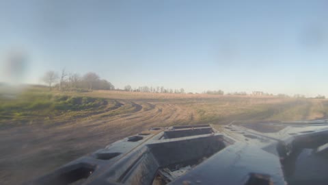 ATV riding through Mud on a Trail