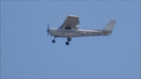 Zooming up to a small plane and pilot