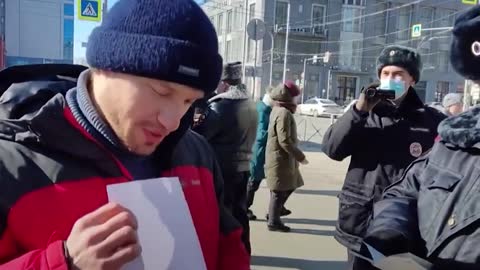 Russian Protester Arrested for Holding Sheet of Paper
