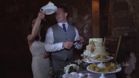 Groom cuts and serves the cake in one move!
