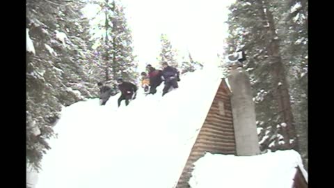 Family Creates Mini-Avalanche Trying To Clear Snow Off Roof