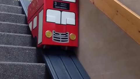 This Pup Goes Down The Stairs With The Help Of A Pimped-Out Stairlift