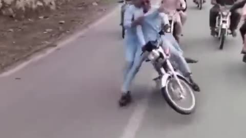 Trying to ride on one wheel