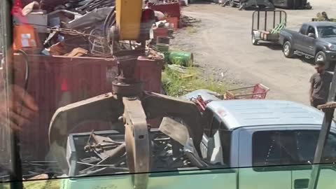 Scrapyard Crane Takes Bed Off Truck