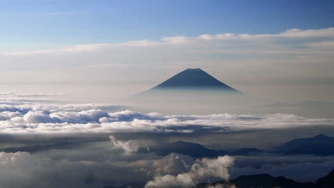 Mount Fuji Morning- How Mount Fuji morning looks like from the top in the clouds