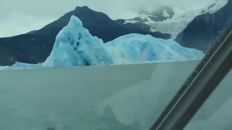 Iceberg flipping over..