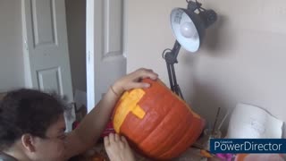 Carving crosses into pumpkin part1