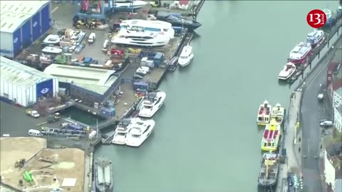 Aerial footage shows scale of oil leak into southern England harbour