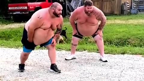 Two fat people in action