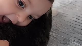 Kid playing with cat 😺