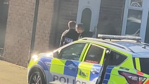 Police Break Down Door as Suspect Jumps Out Window