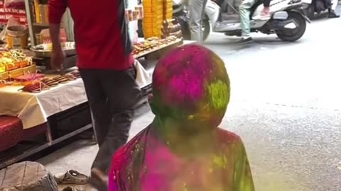 Preparation of color balloons at the traditional Holi festival in India.