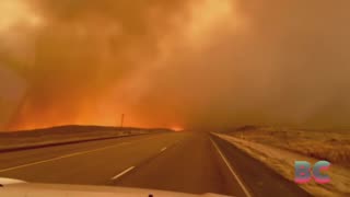 Firefighters seek to corral massive Texas wildfires