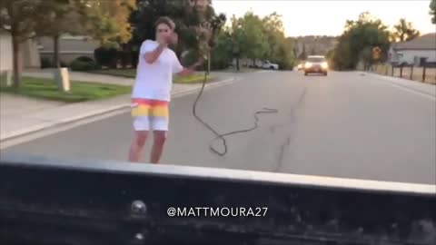 Young Man Skate Surfing Behind Truck Fail
